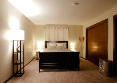 Bedroom with plentiful closet space at Forest Ridge Apartments